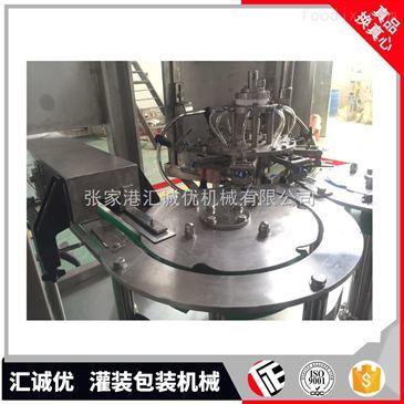 揭秘高效生產核心 沖洗、灌裝、封口三合一飲料包裝機